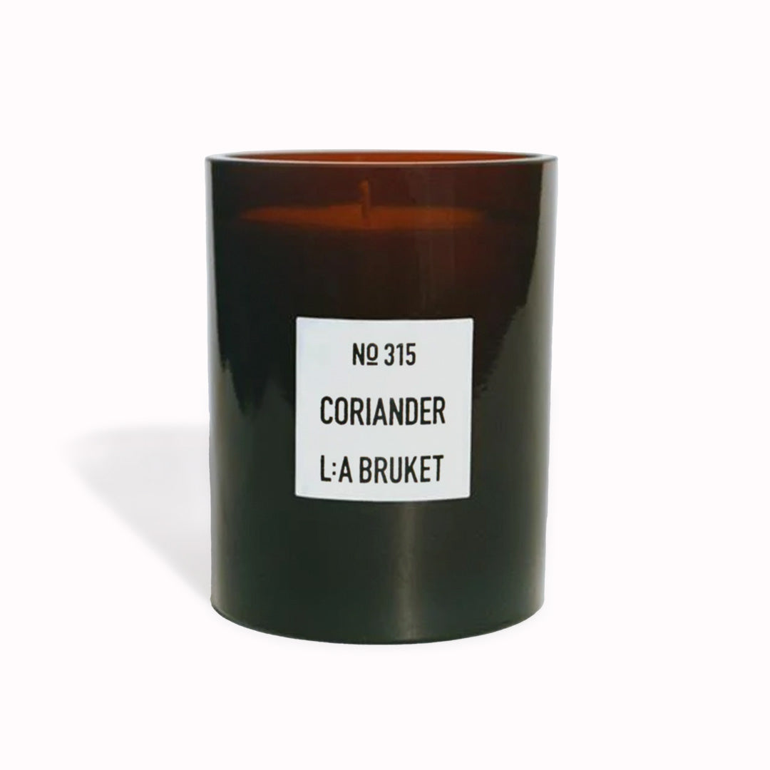 315 Coriander is a refillable scented candle from L:A Bruket, made of wax from organic soy with a burn time of more than 45 hours.