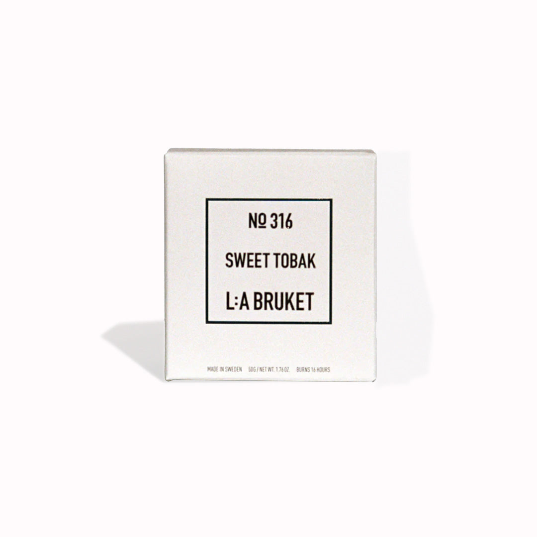 316 Sweet Tobak is a room filling fragrance from the Swedish self-care brand. It has a base fragrance of tobacco leaves, cedarwood with earthy dry notes.