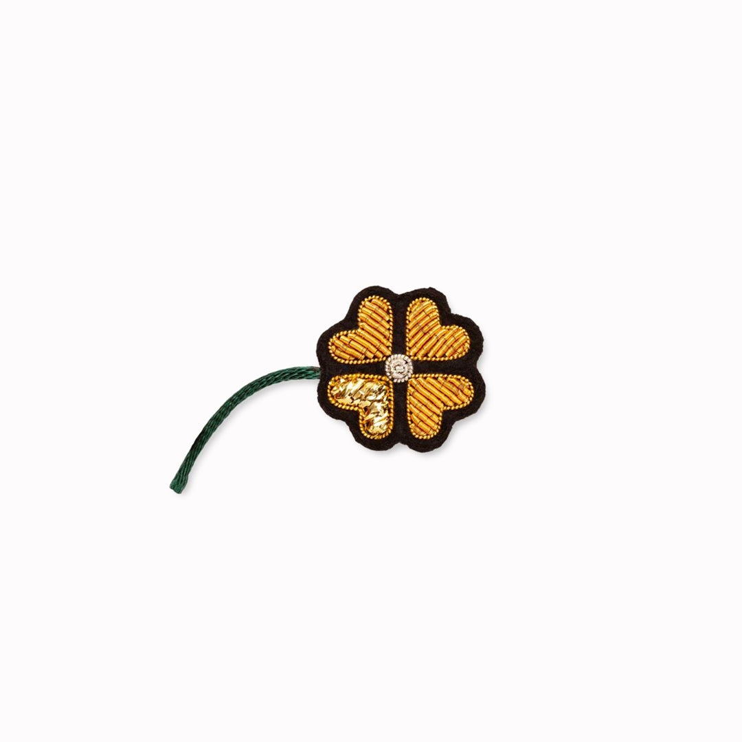 Hand-embroidered 4 Chances lapel pin by Parisian fashion accessory brand Macon et Lesquoy. Measuring approximately 25mm by 25mm, the Light Heart is part of their 'Rock like an Egyptian' Collection.