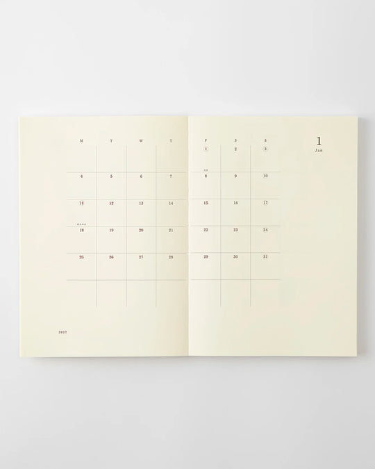 The diary includes block type monthly schedule pages and pages divided into eight sections across a two-page spread for use as a weekly schedule.