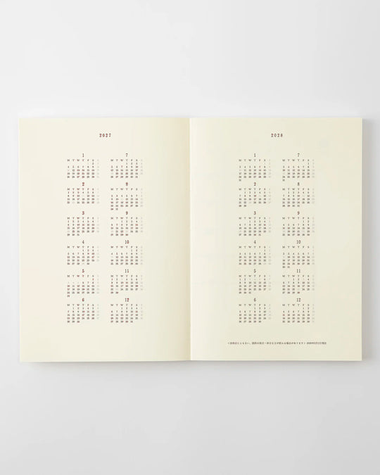 The diary includes block type monthly schedule pages and pages divided into eight sections across a two-page spread for use as a weekly schedule.