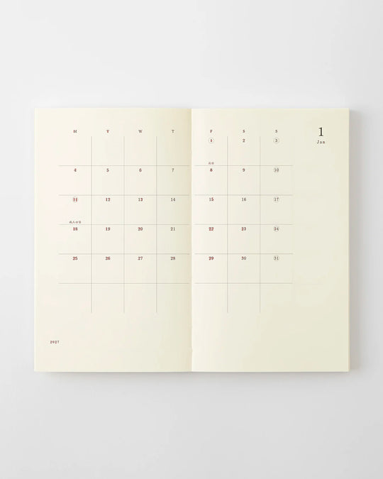 The diary includes block type monthly schedule pages and pages divided into eight sections across a two-page spread for use as a weekly schedule.