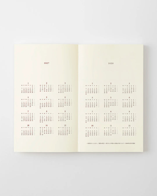 The diary includes block type monthly schedule pages and pages divided into eight sections across a two-page spread for use as a weekly schedule.