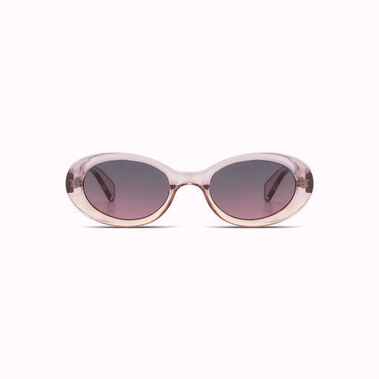 The Ana is fiercely original with its oval lenses set in a sleek rounded frame. Not only made from sustainable materials, but also scoring high in the fashion stakes, the Ana could quickly become your favourite sunglasses. These sunglasses are unisex, so are suitable for both men and women.  With a delicately coloured rose blush Bio Nylon frame and dark blue to red lenses, the Ana Blush manages to be both elegant and fierce. A future classic.