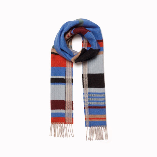 Angus is a classic Wallace Sewell stripe where dynamic, bold bands of colour meet finer stripes, and delicate hopsack details peek through, creating an interplay of scale and texture.