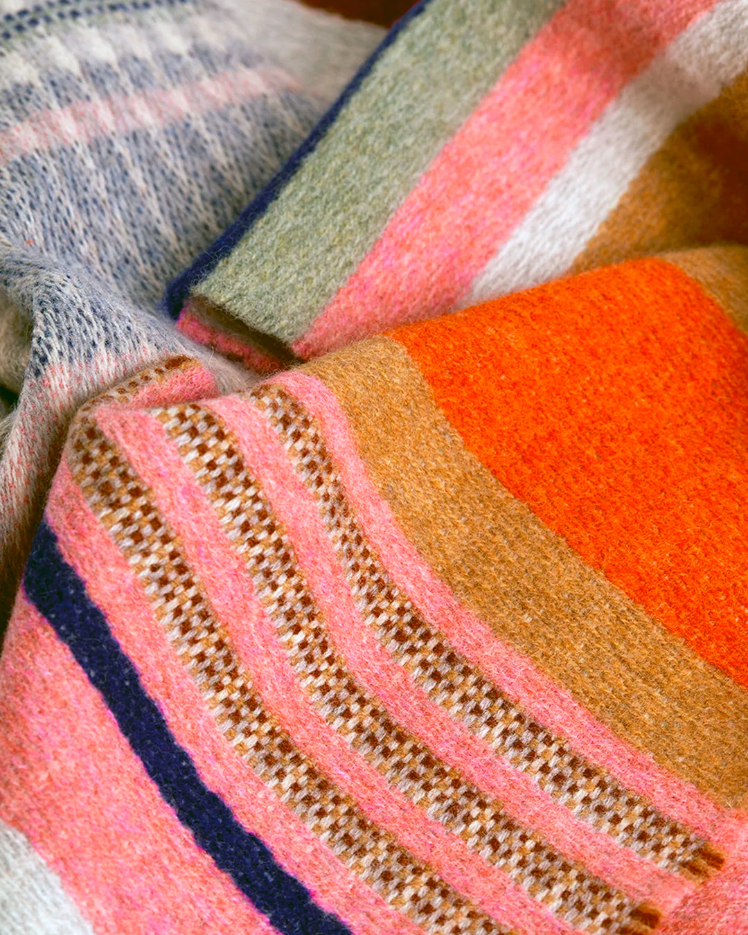 Angus is a classic Wallace Sewell stripe where dynamic, bold bands of colour meet finer stripes, and delicate hopsack details peek through, creating an interplay of scale and texture.