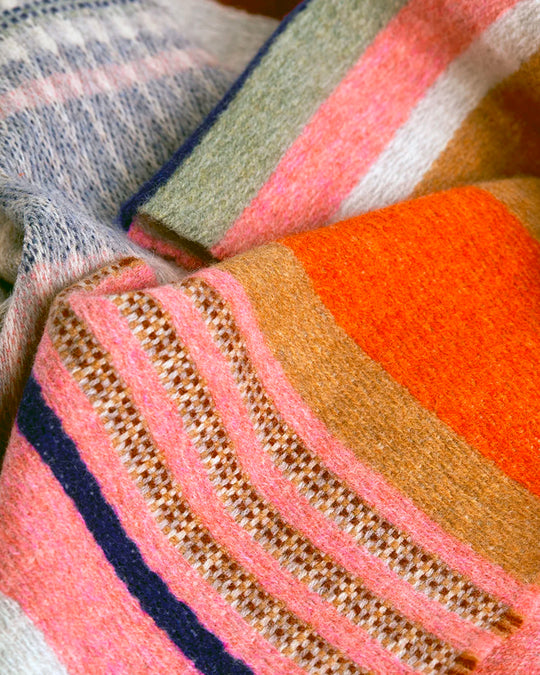 Angus is a classic Wallace Sewell stripe where dynamic, bold bands of colour meet finer stripes, and delicate hopsack details peek through, creating an interplay of scale and texture.