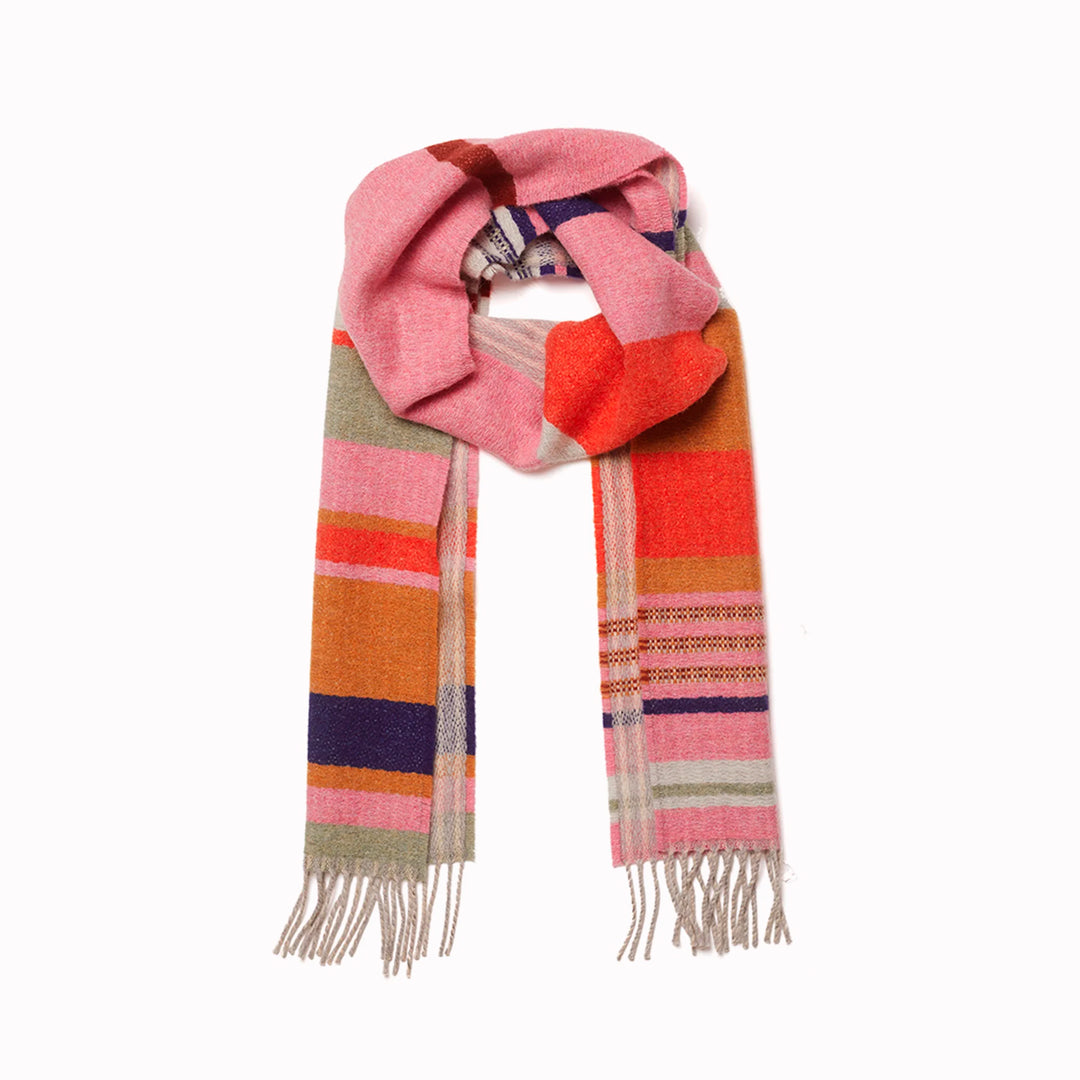 Angus is a classic Wallace Sewell stripe where dynamic, bold bands of colour meet finer stripes, and delicate hopsack details peek through, creating an interplay of scale and texture.
