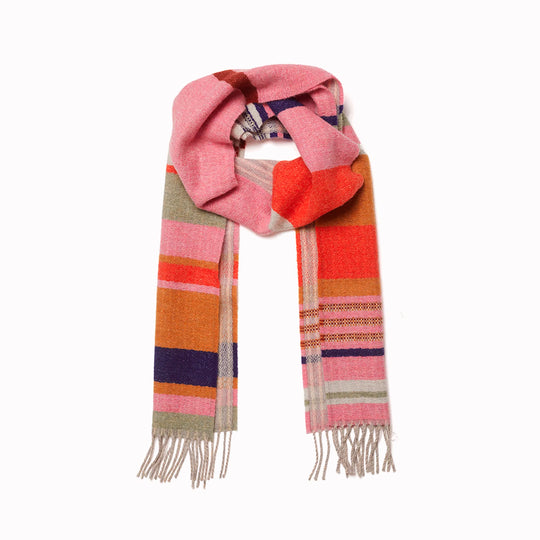 Angus is a classic Wallace Sewell stripe where dynamic, bold bands of colour meet finer stripes, and delicate hopsack details peek through, creating an interplay of scale and texture.