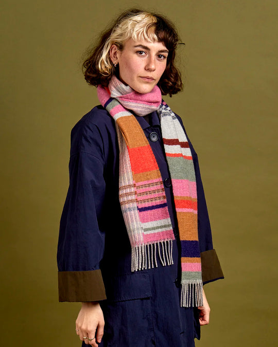 Angus is a classic Wallace Sewell stripe where dynamic, bold bands of colour meet finer stripes, and delicate hopsack details peek through, creating an interplay of scale and texture.