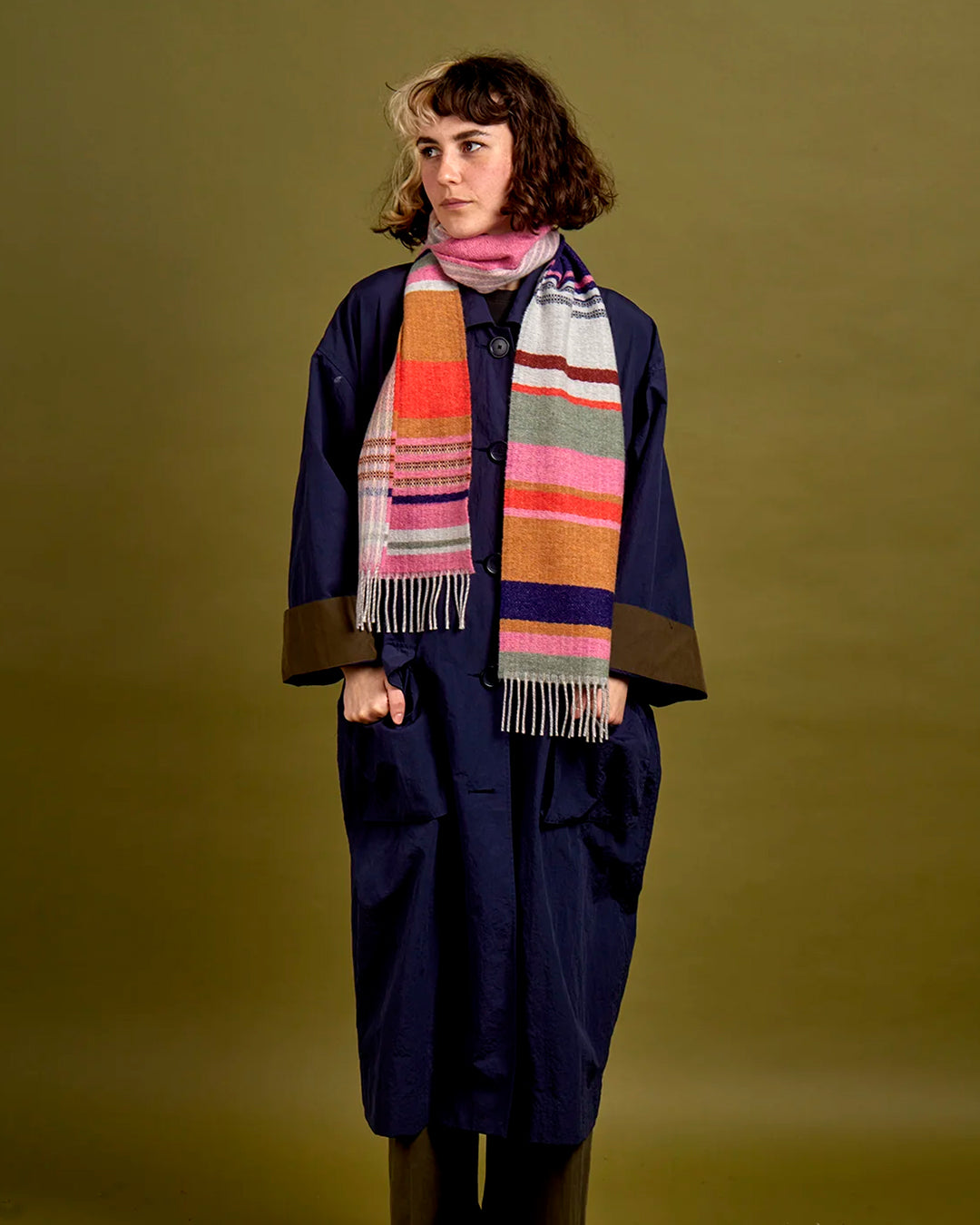 Angus is a classic Wallace Sewell stripe where dynamic, bold bands of colour meet finer stripes, and delicate hopsack details peek through, creating an interplay of scale and texture.