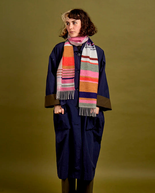 Angus is a classic Wallace Sewell stripe where dynamic, bold bands of colour meet finer stripes, and delicate hopsack details peek through, creating an interplay of scale and texture.