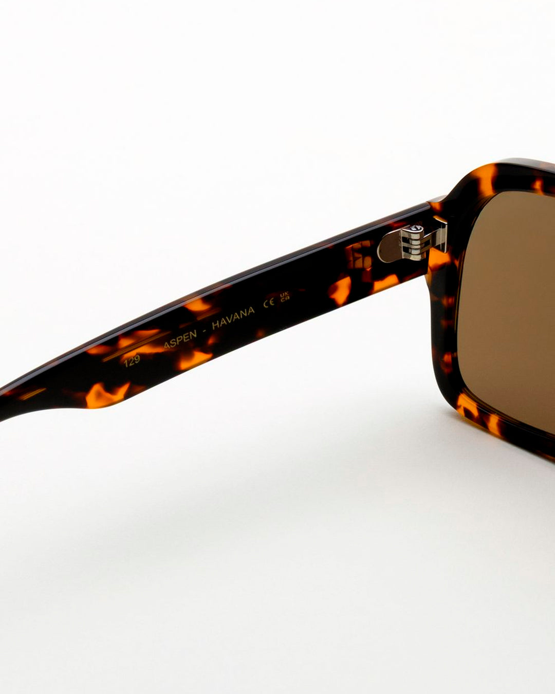 The frame is handmade from plant-based acetate, finished with Carl Zeiss CR-39 lenses. The lens sits wide and close, offering a broad field of vision with reduced side glare. 