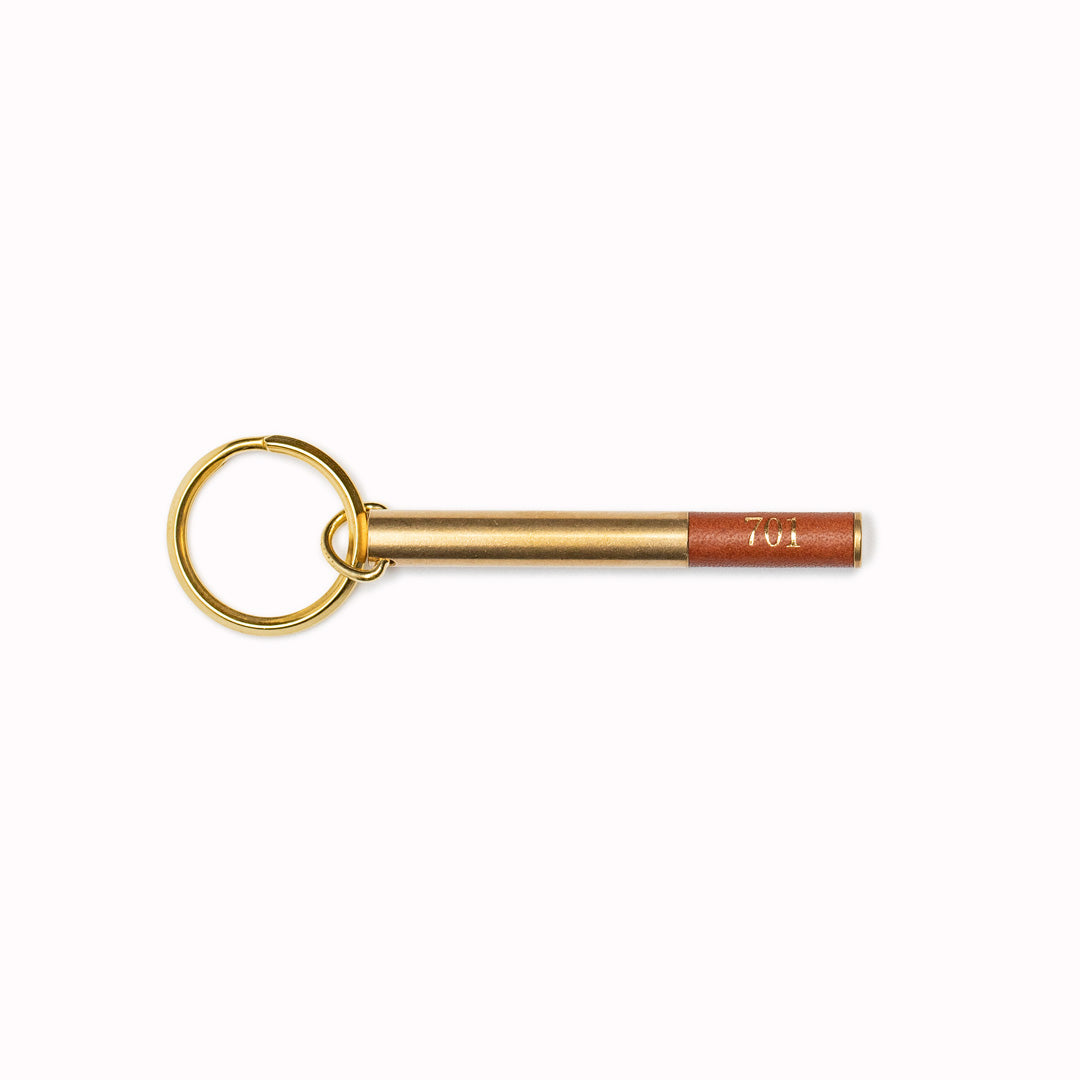 Brass cylindrical keyring from Japanese brand Picus. These small but weighty keychains have been designed to resemble upmarket hotel key fobs