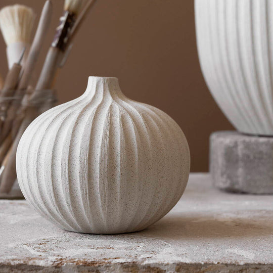 Bari - Sand White Deep Line Vase from Swedish design brand Lindform produce ceramics and glassware inspired by the organic tones of Scandinavian nature, while their simple shapes also draw influence from Japanese minimalist styling.