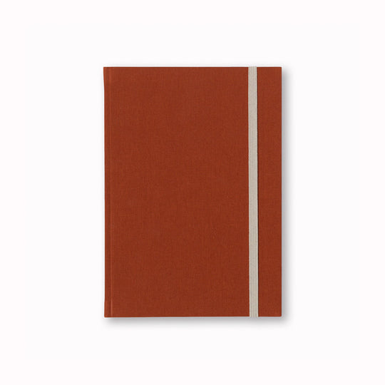 Notem Bea, This A5 Dark Sienna notebook has 140 pages of high-quality lined paper, with an elastic closure.