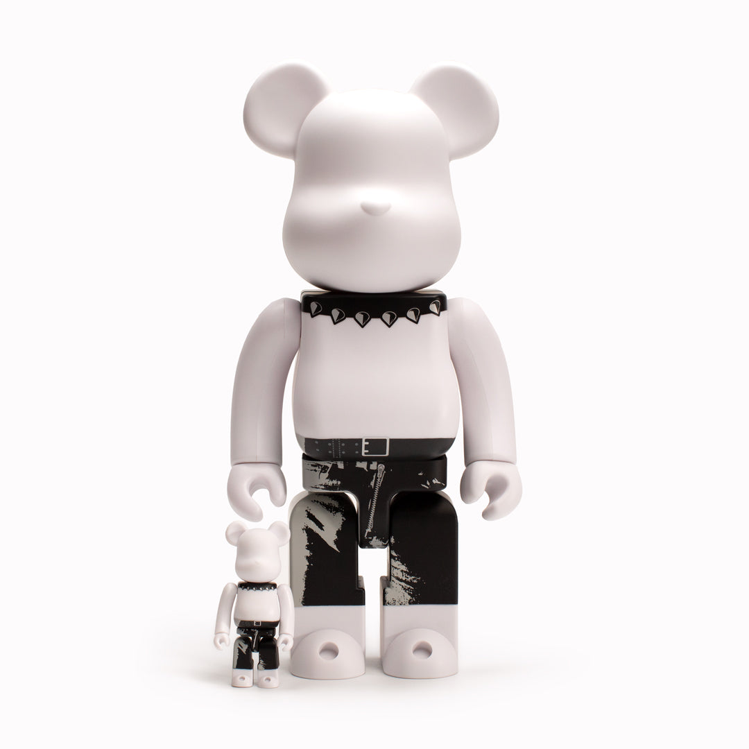 Introducing the renowned Japanese modern collectible designer toy, Bearbrick 400%, from Medicom. This design features Andy Warhol's legendary 1971 Rolling Stones cover, 'Sticky Fingers.'