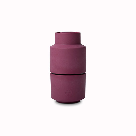 A rich beetroot coloured Danish designed Billund spice grinder from CrushGrind is a 12cm tall upside-down grinder with a powerful ceramic grinding module that makes easy work of grinding salt, pepper, dried herbs and most spices.