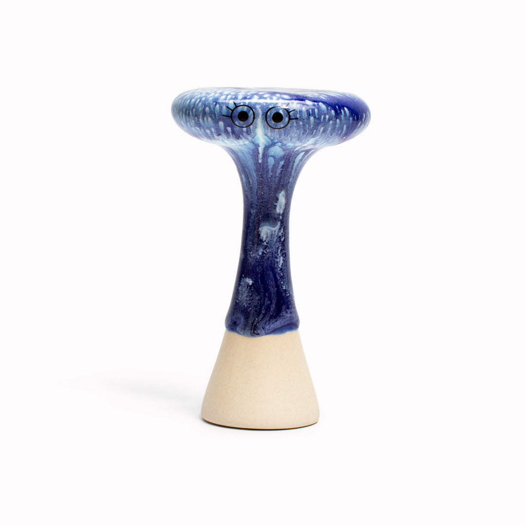 Blue Bern is a thin mushroom shaped, hand glazed ceramic figurine created as a close relative of the classic Arhoj Ghost. The Familia is a continuation of the playful decorative object series from Studio Arhoj.