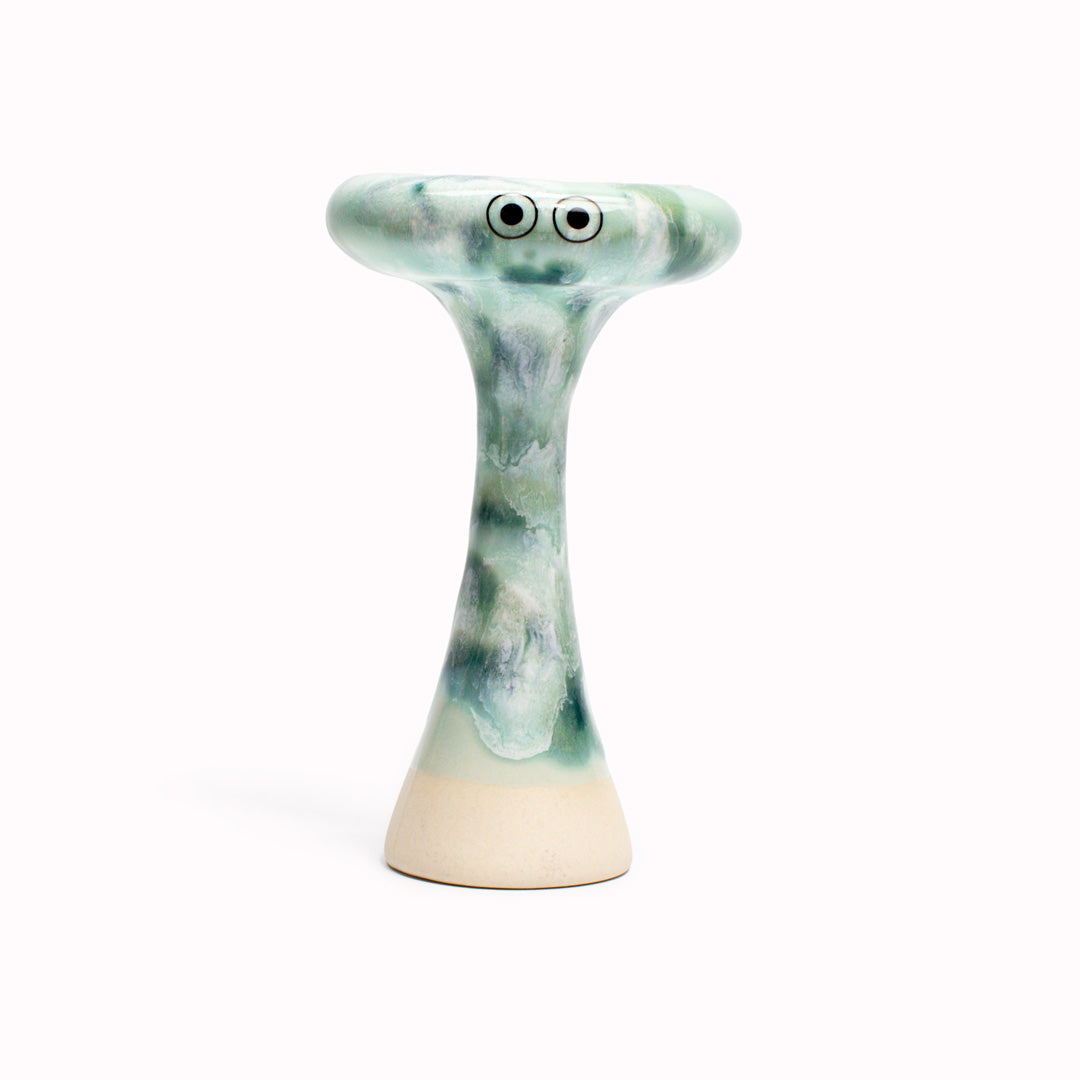 Green Bern is a thin mushroom shaped, hand glazed ceramic figurine created as a close relative of the classic Arhoj Ghost. The Familia is a continuation of the playful decorative object series from Studio Arhoj.