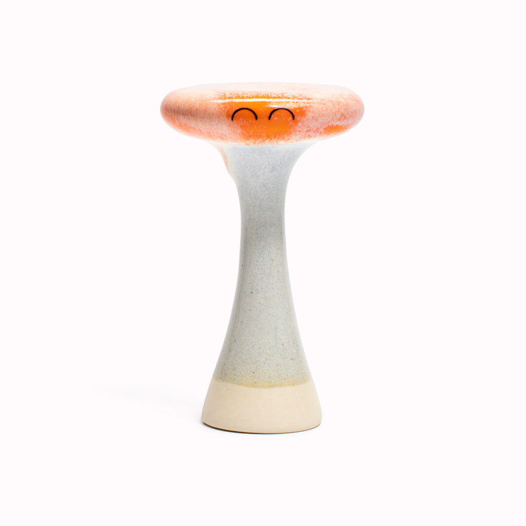 Orange Bern is a thin mushroom shaped, hand glazed ceramic figurine created as a close relative of the classic Arhoj Ghost. The Familia is a continuation of the playful decorative object series from Studio Arhoj.