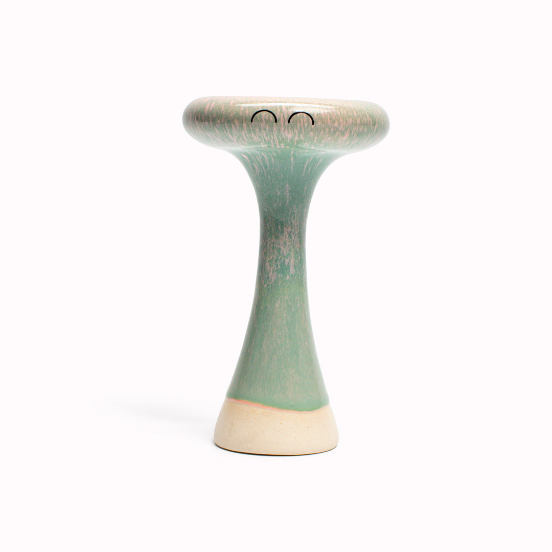 Rose Green Bern is a thin mushroom shaped, hand glazed ceramic figurine created as a close relative of the classic Arhoj Ghost. The Familia is a continuation of the playful decorative object series from Studio Arhoj.