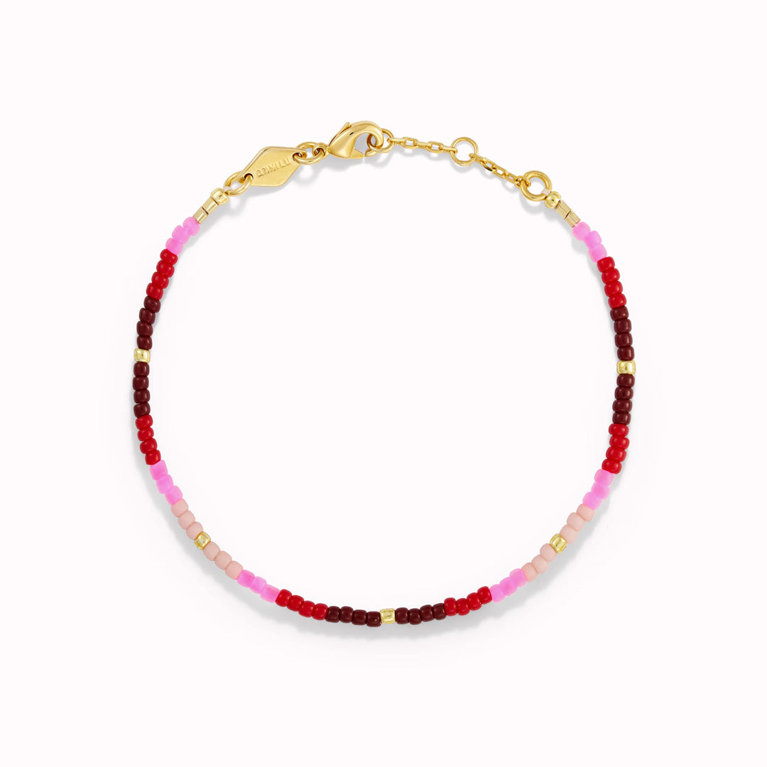 The Tie Dye Berry Necklace by Anni Lu is a vibrant and playful piece, crafted in brass with 18-Carat gold plating and anti-tarnish e-coating.