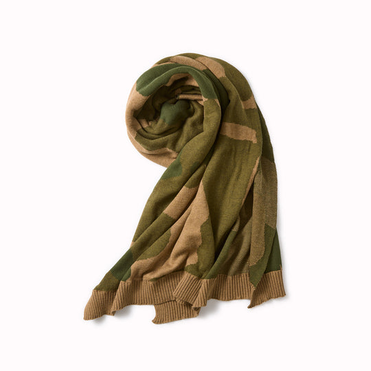 A tube-shaped shawl from Rototo Japan in dark beige and green camouflage colors, knitted with a ribbed pattern at the edges.