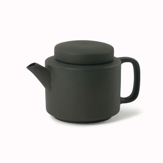 Large stoneware teapot from Dutch company Kinta who produce contemporary ceramics and homeware. The large teapot is black, with a soft matt exterior finish. Its design is influenced  by ceramic trends of the 1960s, but with a pleasing modern and neutral colour palette.