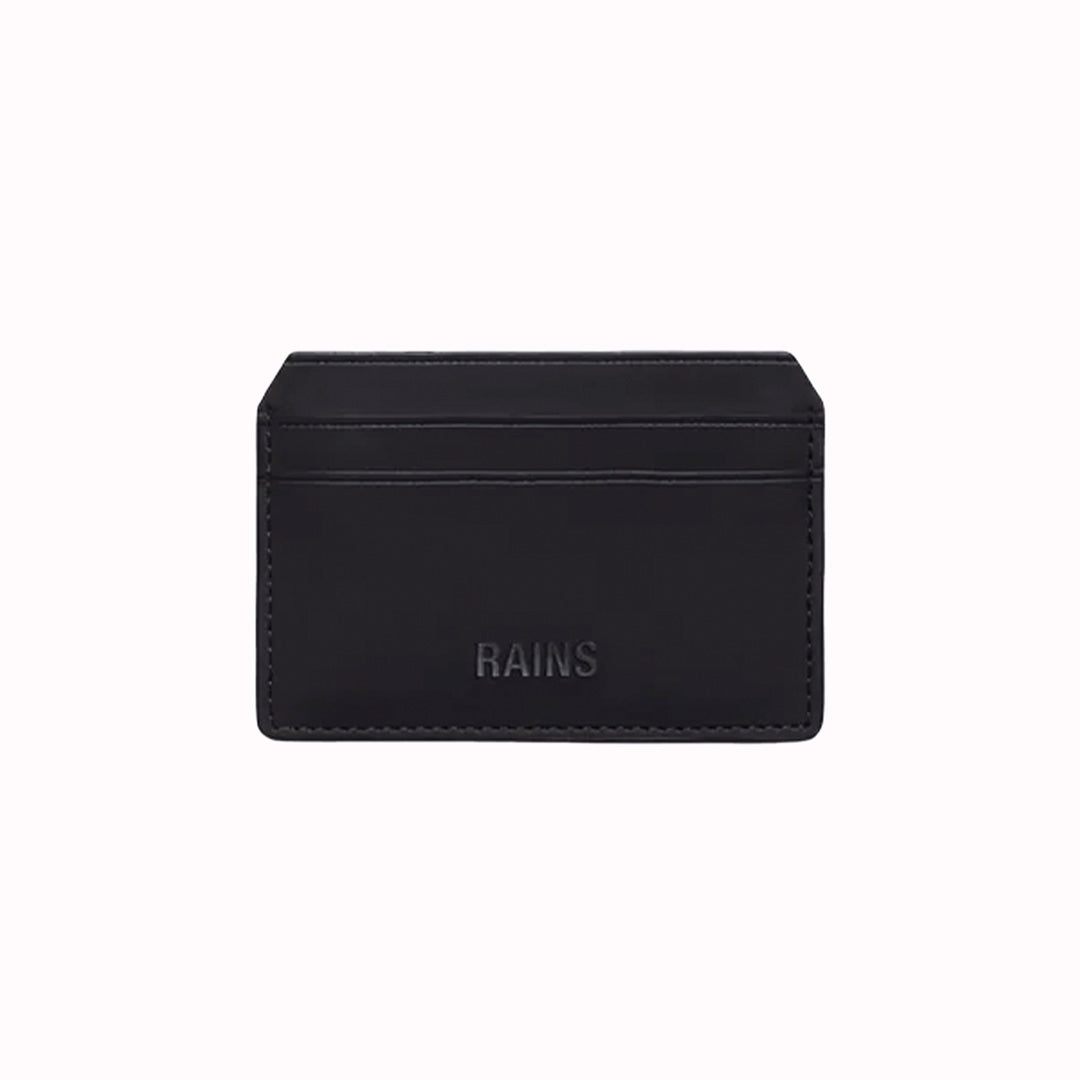 Card Holder in Black is crafted from Rains’ signature water-resistant fabric with a matte finish, engineered for strength, durability and smooth feel. Their minimal take on the credit card wallet. A vegan card holder with four card slots, two on each side, with a central slot for more cards or cash notes. 