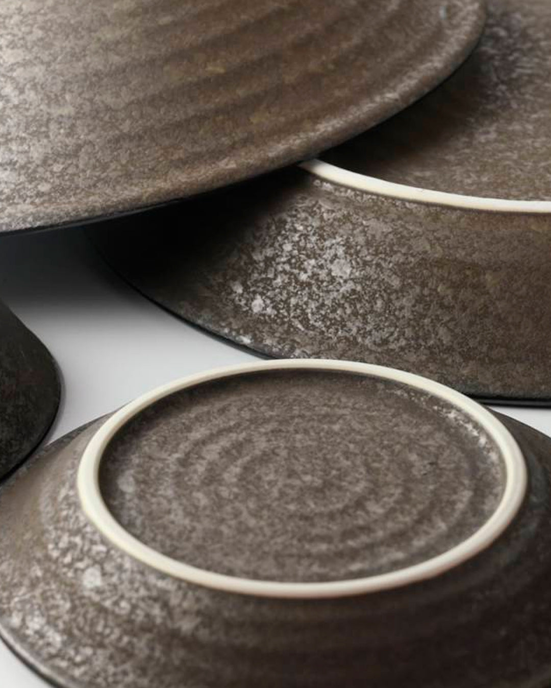 Rough textured Donburi bowl with matt glaze in a dark brown shade that catches the light to reveal a silvery shimmer. Suitable for serving individual rice portions, or any number of side dishes.