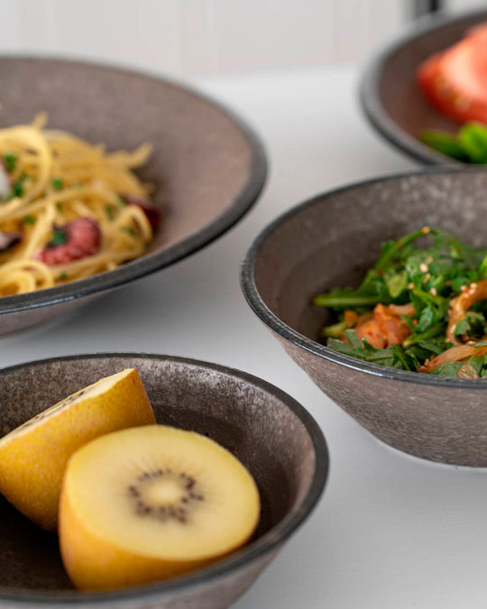 Rough textured Donburi bowl with matt glaze in a dark brown shade that catches the light to reveal a silvery shimmer. Suitable for serving individual rice portions, or any number of side dishes.
