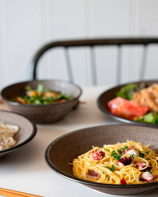 Rough textured Donburi bowl with matt glaze in a dark brown shade that catches the light to reveal a silvery shimmer. Suitable for serving individual rice portions, or any number of side dishes.