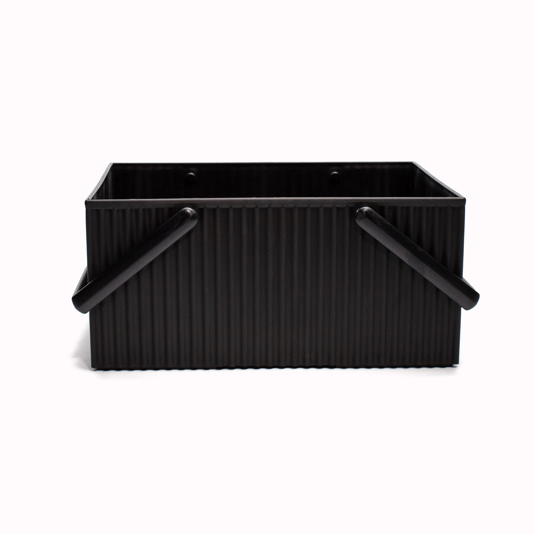 Black coloured homeware stacking box with matching black carry handles.