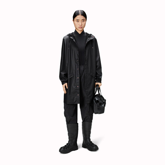 Contemporary unisex rain jacket from Danish Outerwear and Lifestyle company Rains. This long black rain jacket is c<span data-mce-fragment="1">haracterized by a minimal silhouette in a long design.</span>