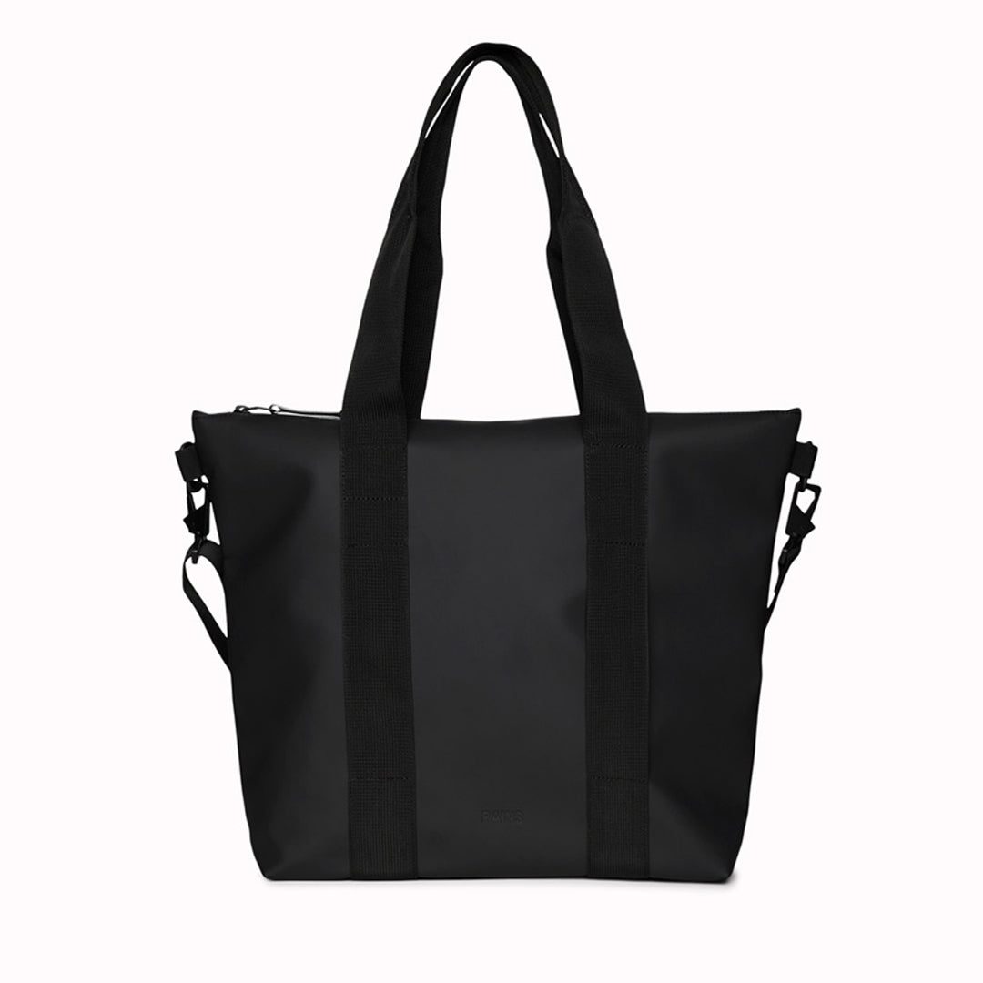 Rains' Tote Bag Mini W3 is a waterproof tote bag and an ideal companion for shopping trips as well as commuting to the office.