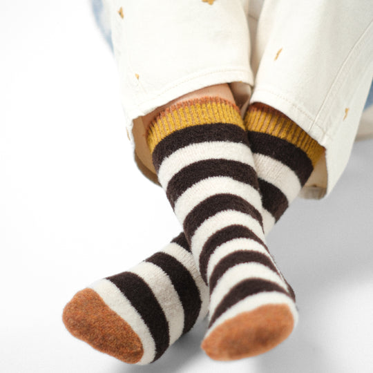 The French brand Bonne Maison creates high quality socks with Egyptian cotton and an elastane double thread. These fluffy mid-rise socks are machine washable at 30/40° C. The composition of these thin socks is : 62% wool, 37% polyamide, 1% elastane. This perfect mix offers to these fluffy socks warmth and comfort.