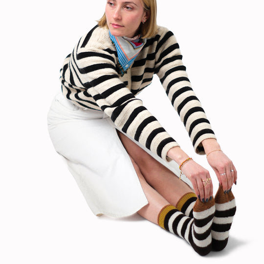 The French brand Bonne Maison creates high quality socks with Egyptian cotton and an elastane double thread. These fluffy mid-rise socks are machine washable at 30/40° C. The composition of these thin socks is : 62% wool, 37% polyamide, 1% elastane. This perfect mix offers to these fluffy socks warmth and comfort.