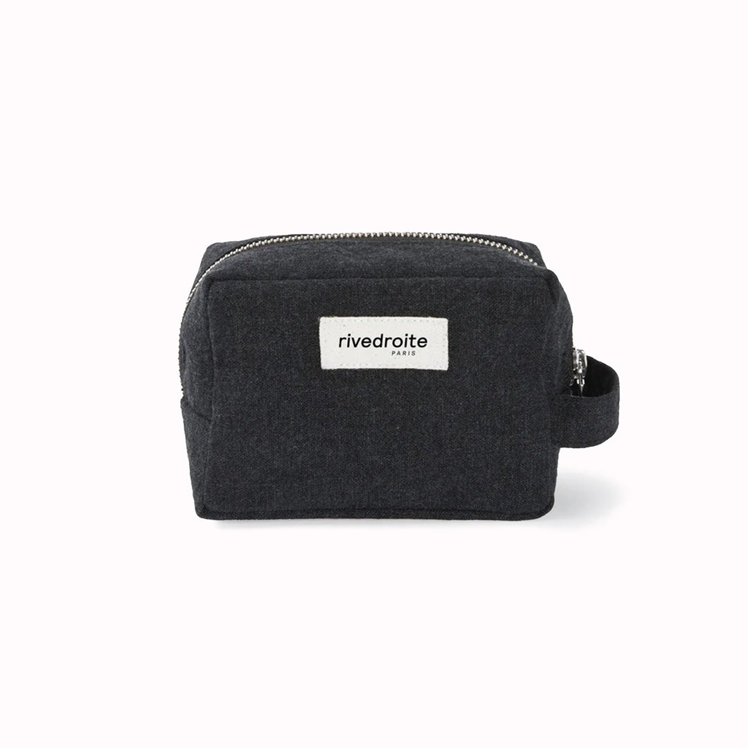 Black Tournelles bag from Parisian brand Rives Droite is a compact everyday toiletry make up bag made from re-cycled cotton.