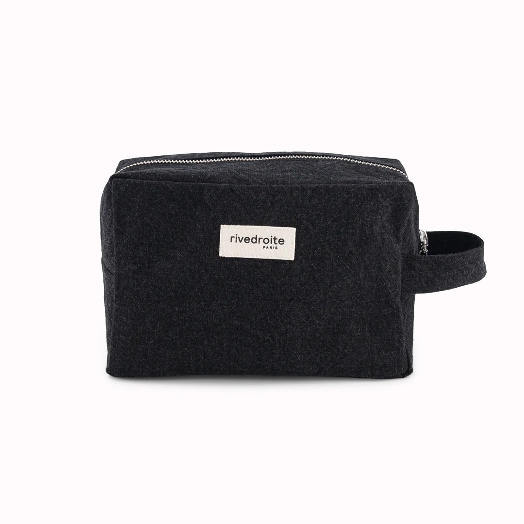 Black Tournelles XL. A zippered pouch in a pleasing cube shape which is large enough for essential make up items on a weekend away.