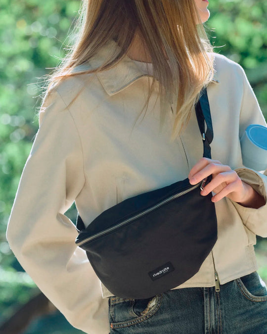 The Custine Belt Bag with an AW26 update - same original size and shape reworked with a waxed finish to give the new season fabric a richer colour and a worn in appearance over time.