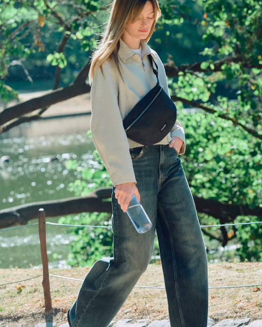 The Custine Belt Bag with an AW26 update - same original size and shape reworked with a waxed finish to give the new season fabric a richer colour and a worn in appearance over time.