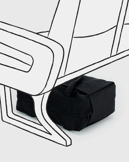 A compact carry-on built around movement. This scaled-down version of BAGGU’s Cloud series keeps the same soft structure, but tightens the proportions for under-seat travel and everyday carry.
