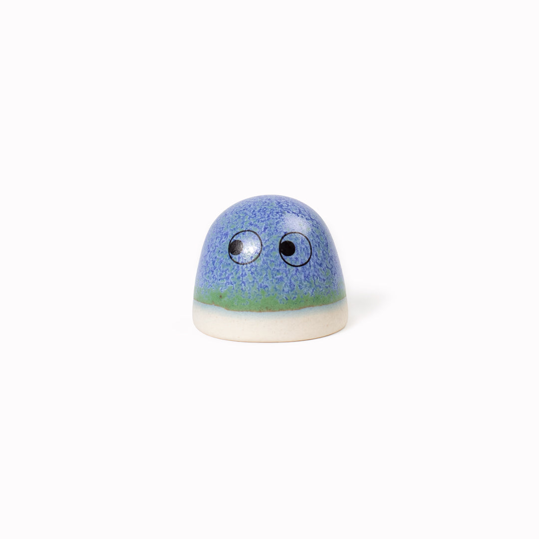 The smallest of the Arhoj decorative ornament figurine family, these tiny little cute dots still have all the personality of their larger siblings. Colourful and handmade in Copenhagen, they have all the Arhoj trademarks with their thick multi coloured glazes and Japanese ceramic influence.
