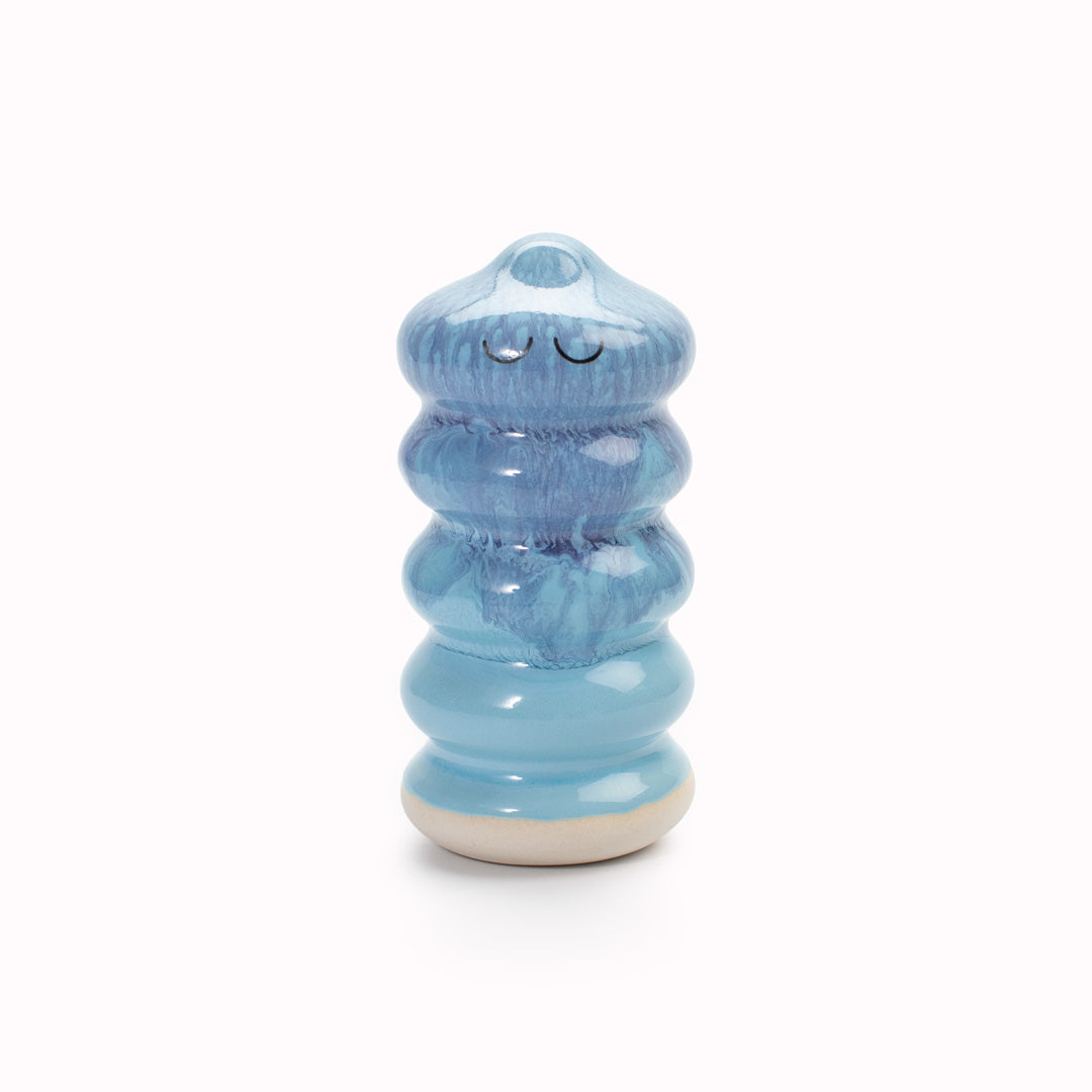 Meet Buru! Buru is a ridged cylinde shaped, hand glazed ceramic figurine created as a close relative of the classic Arhoj Ghost.