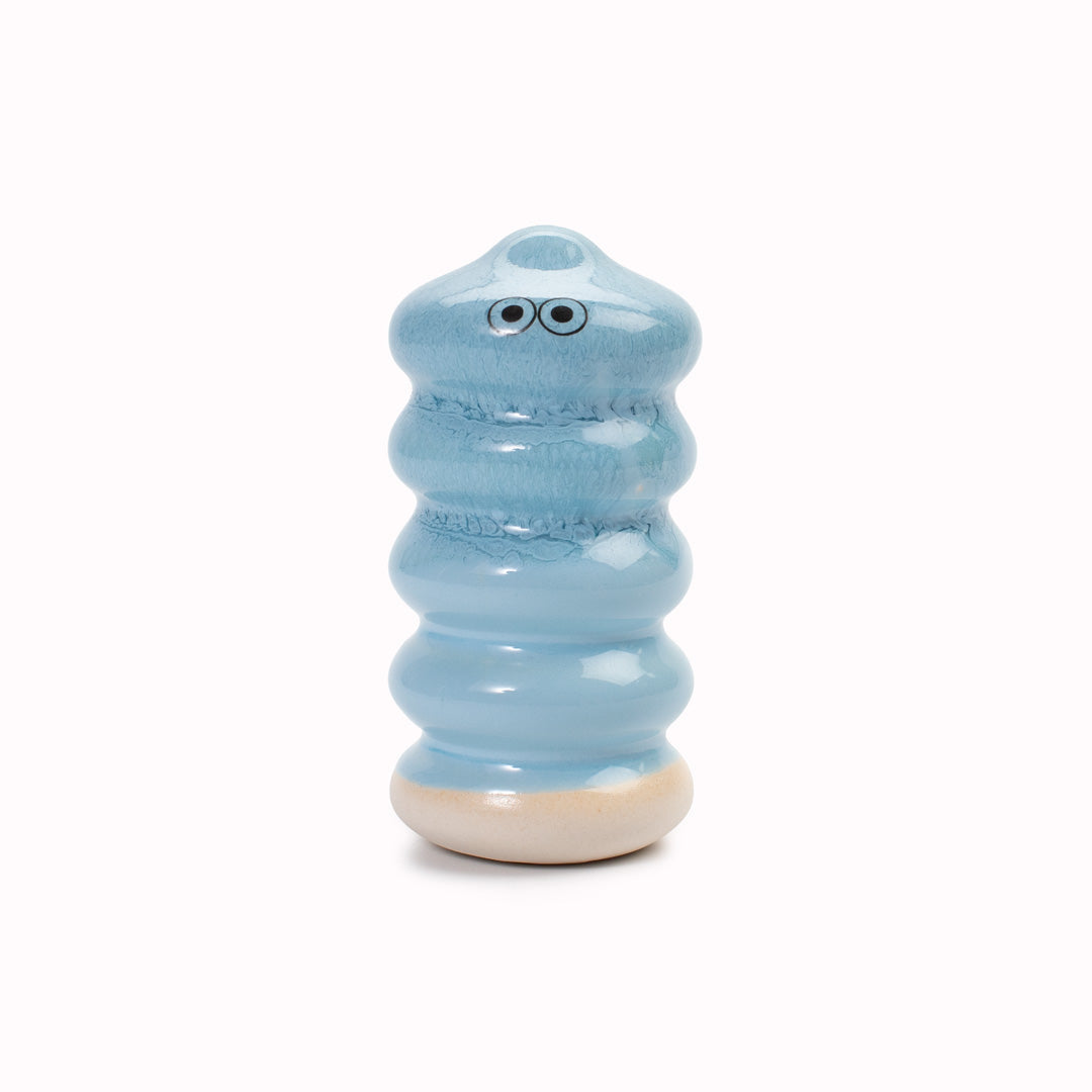 Meet Buru! Buru is a ridged cylinde shaped, hand glazed ceramic figurine created as a close relative of the classic Arhoj Ghost.