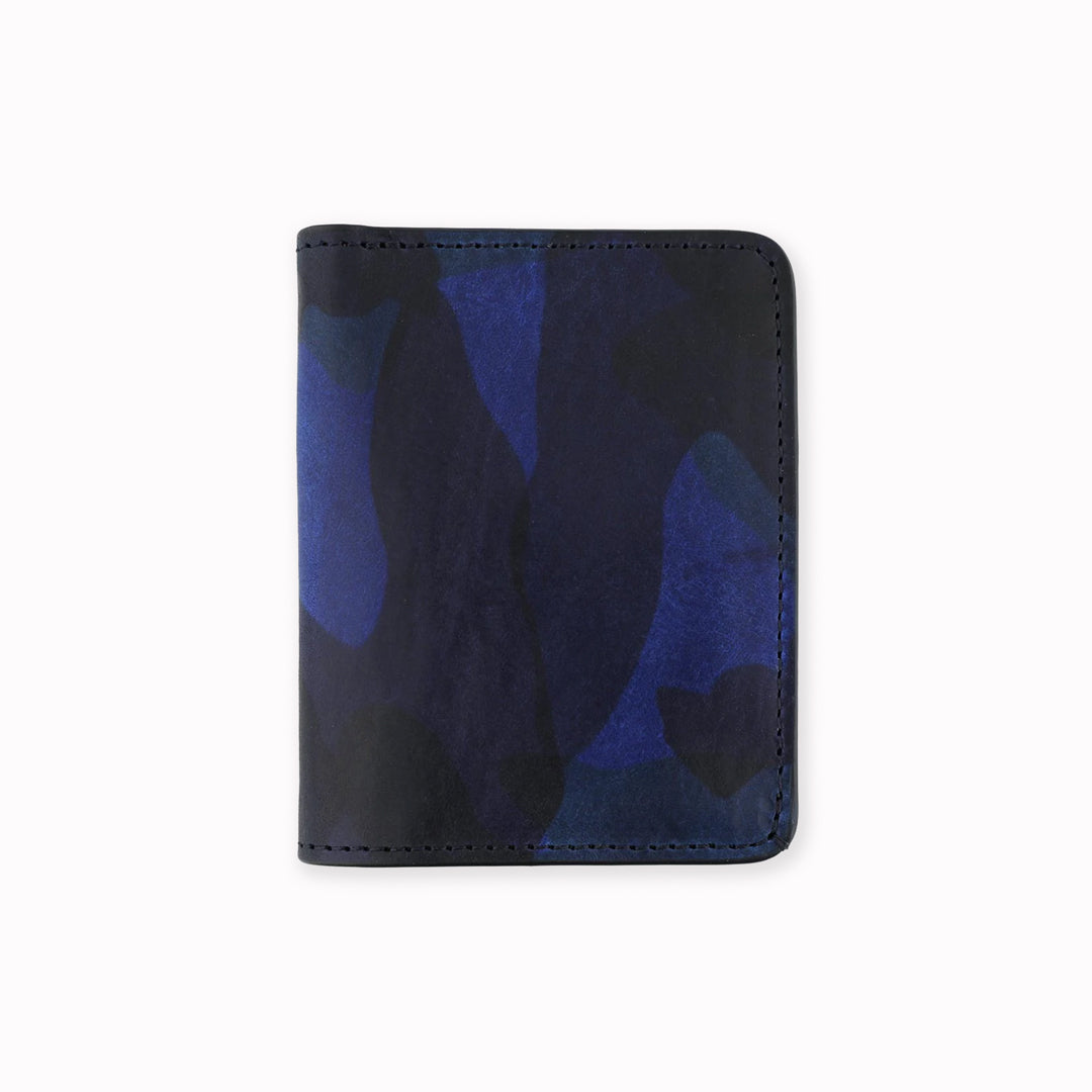 A slim leather wallet from Escuyer, in a Blue toned Camouflage effect pattern. Handmade by Portuguese artisans from leather sourced from a tannery in Tuscany, Italy.&nbsp;