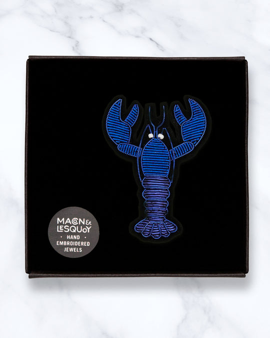 Make a statement with this beautiful Blue Lobster&nbsp;hand embroidered decorative lapel pin by Paris based Macon et Lesquoy - personalise your favourite garments to define your individual style.&nbsp;