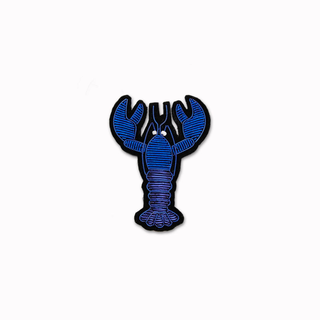 Make a statement with this beautiful Blue Lobster&nbsp;hand embroidered decorative lapel pin by Paris based Macon et Lesquoy - personalise your favourite garments to define your individual style.&nbsp;
