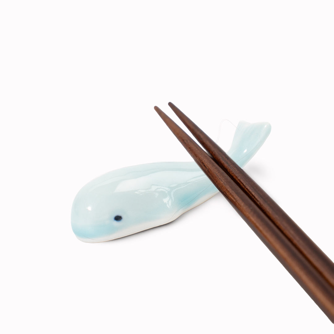 Celadon blue toned porcelain whale chopstick rest made from 'Minoyaki' porcelain, fired at a high temperature and hand finished in Gifu prefecture, Japan.